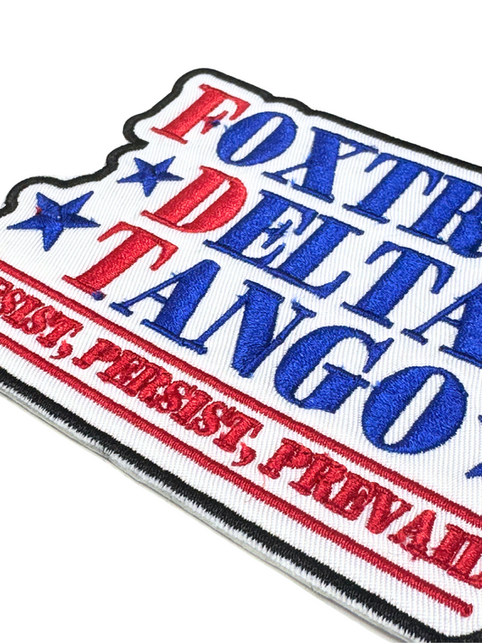 Close-up of Foxtrot Delta Tango patch showing embroidery detail and texture