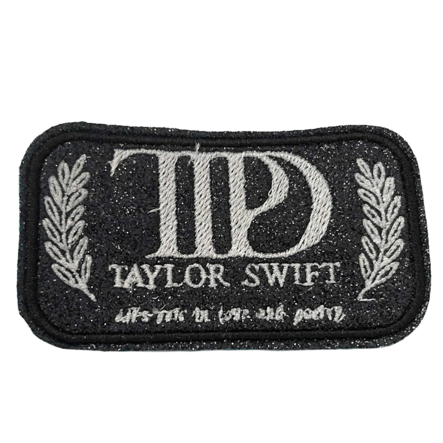 T.S. TTPD all is fair in love an poetry, white on black glitter