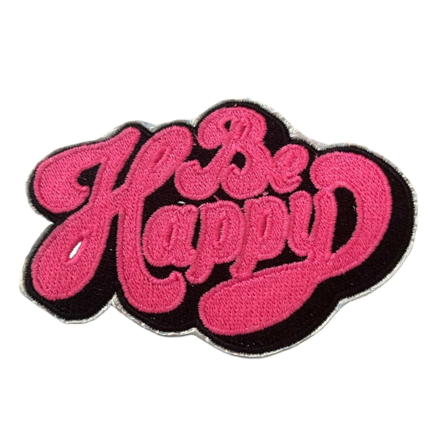 Happy - Neon Pink patch on black background with holographic silver trim.