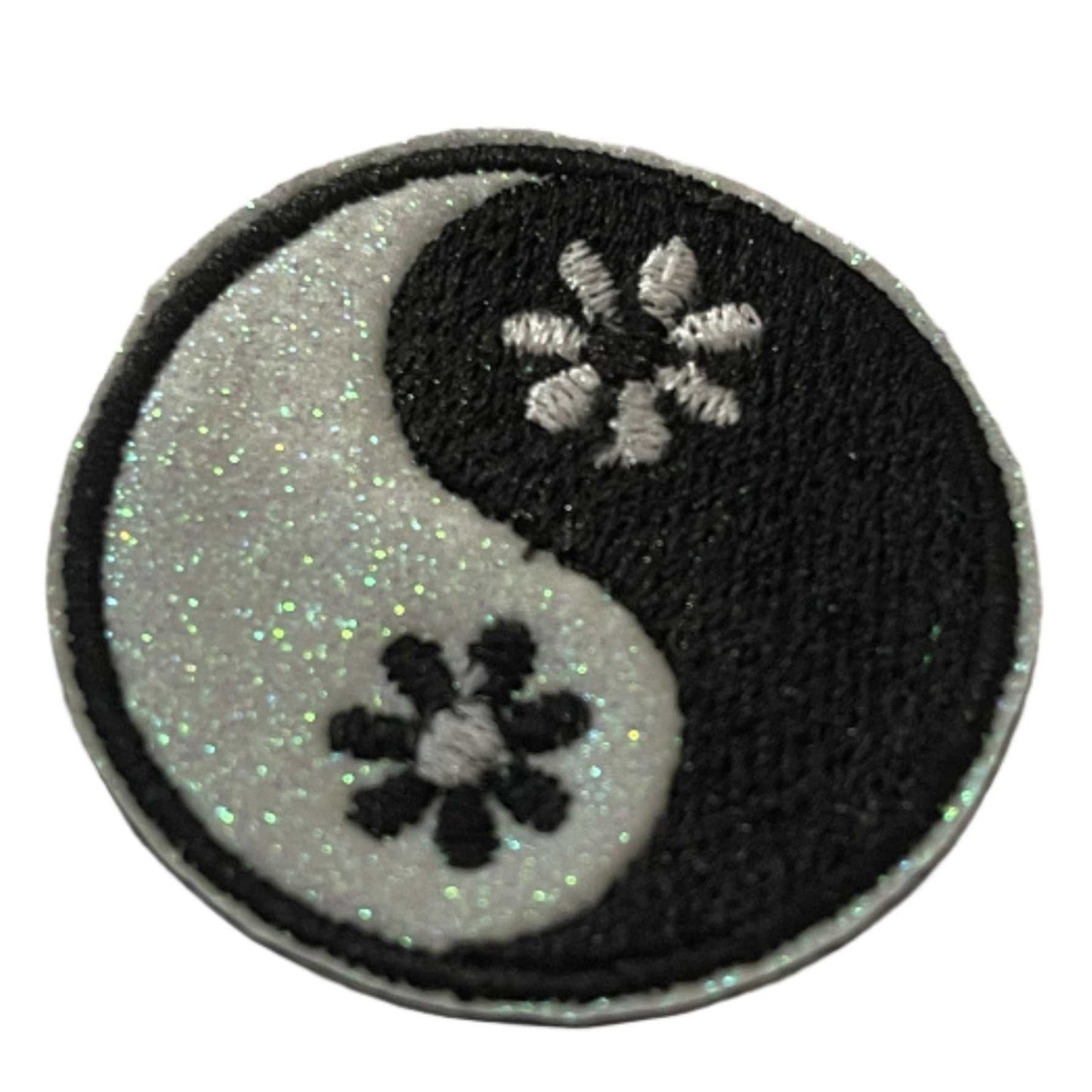 Yin Yang floral embroidered patch with glitter accents for custom hats.