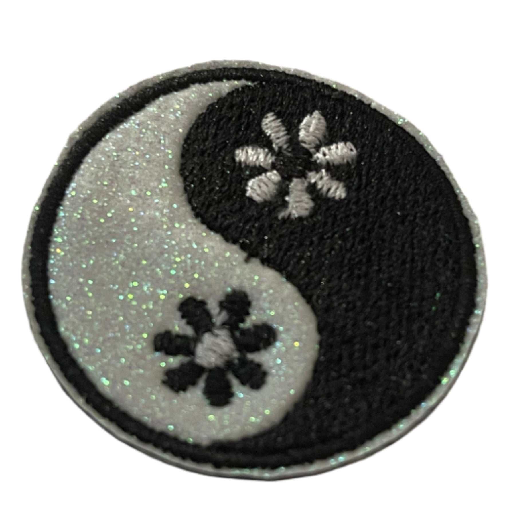 Yin Yang floral embroidered patch with glitter accents for custom hats.