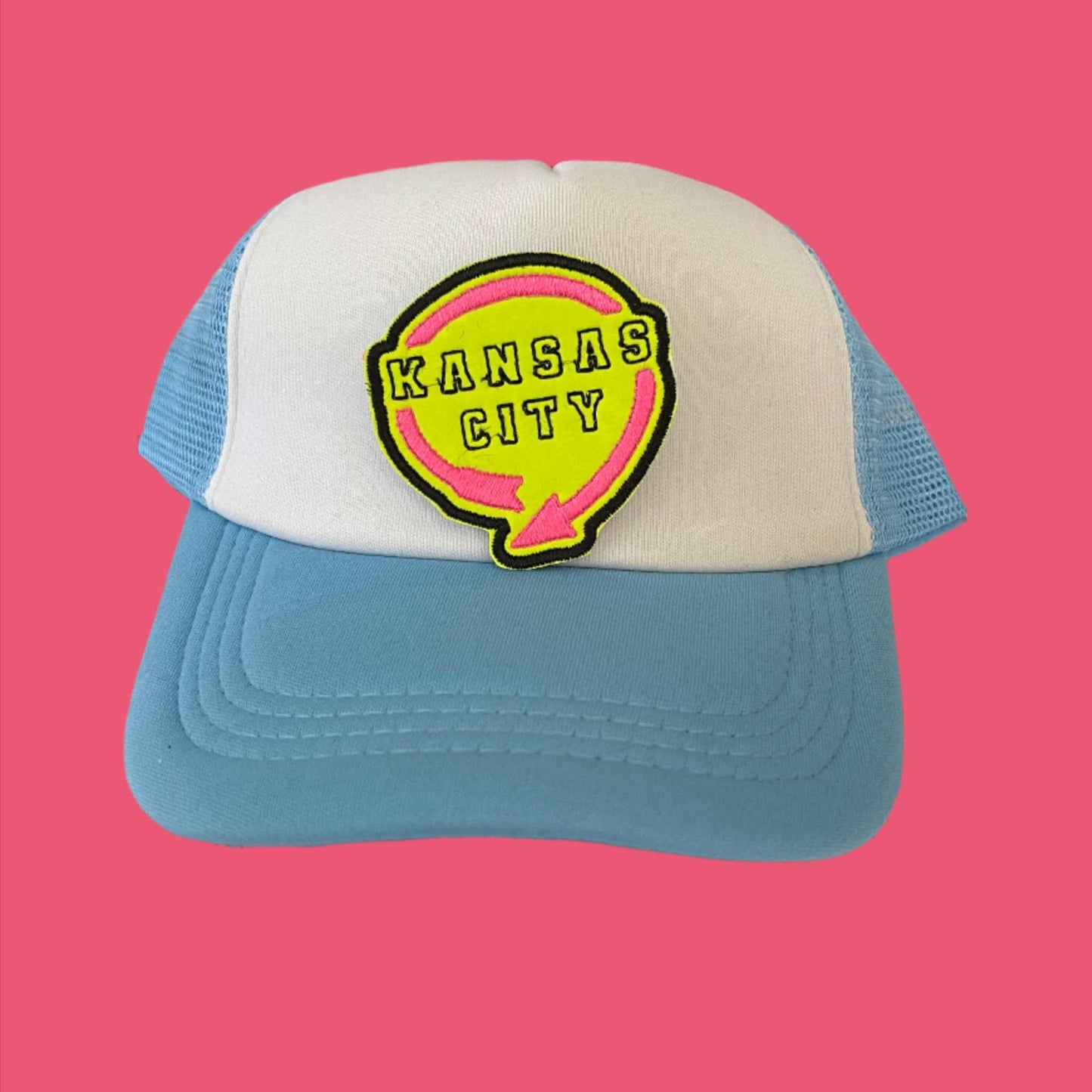 Iron-on patch featuring a design inspired by the Western Auto Building sign in Kansas City, with bold neon colors, showcasing a stylish and retro aesthetic.
