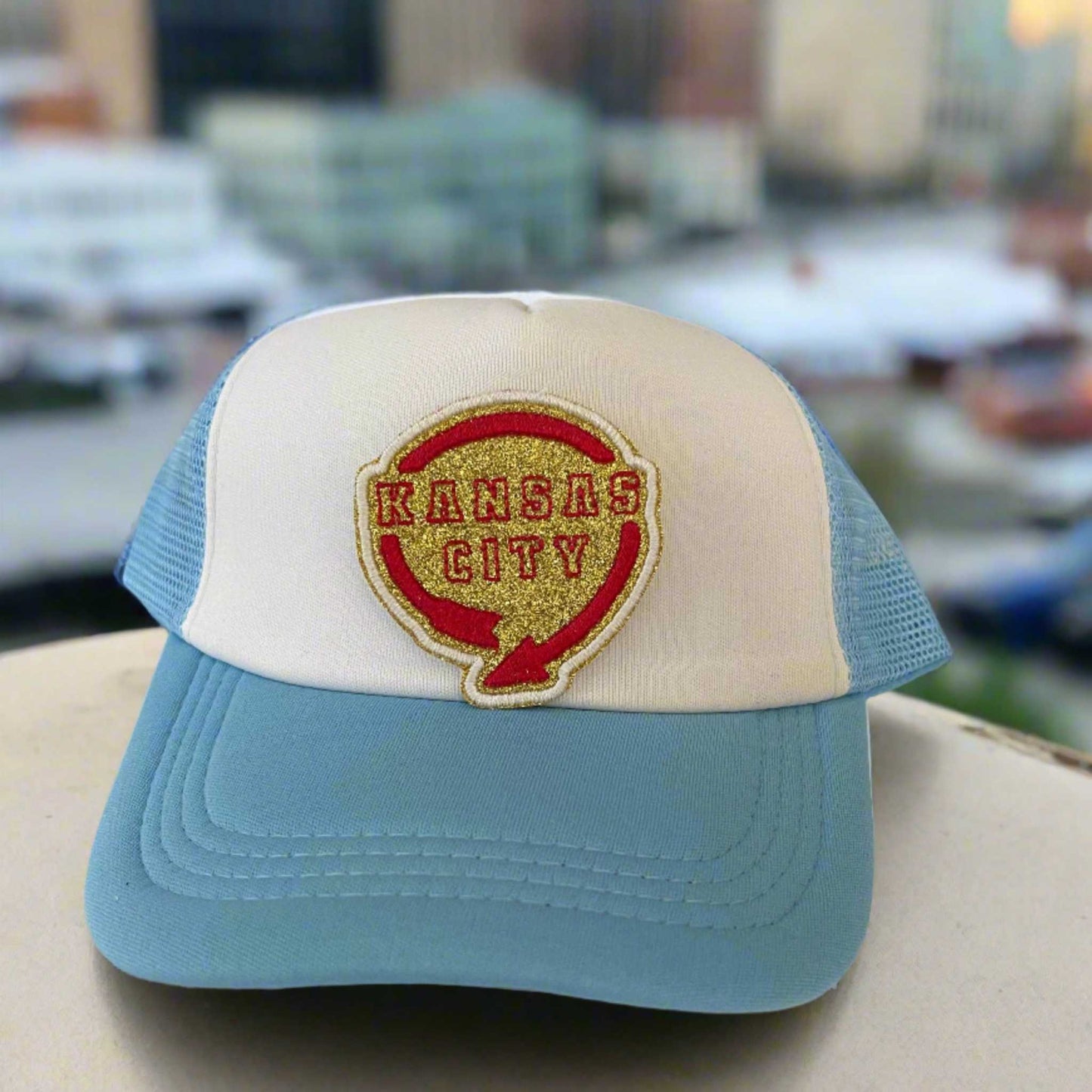 Iron-on patch featuring a design inspired by the Western Auto Building in Kansas City, with bold KC Chiefs colors, showcasing a stylish and retro aesthetic.