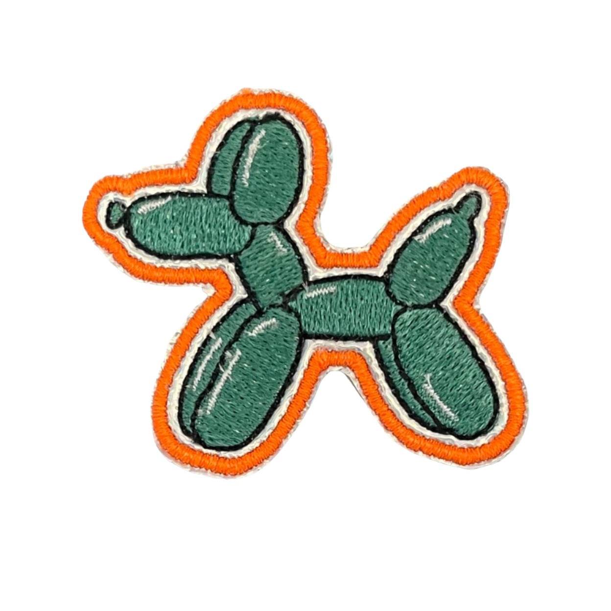 Colorful balloon dog patch with green and orange hues, ideal for customizing hats and accessories.