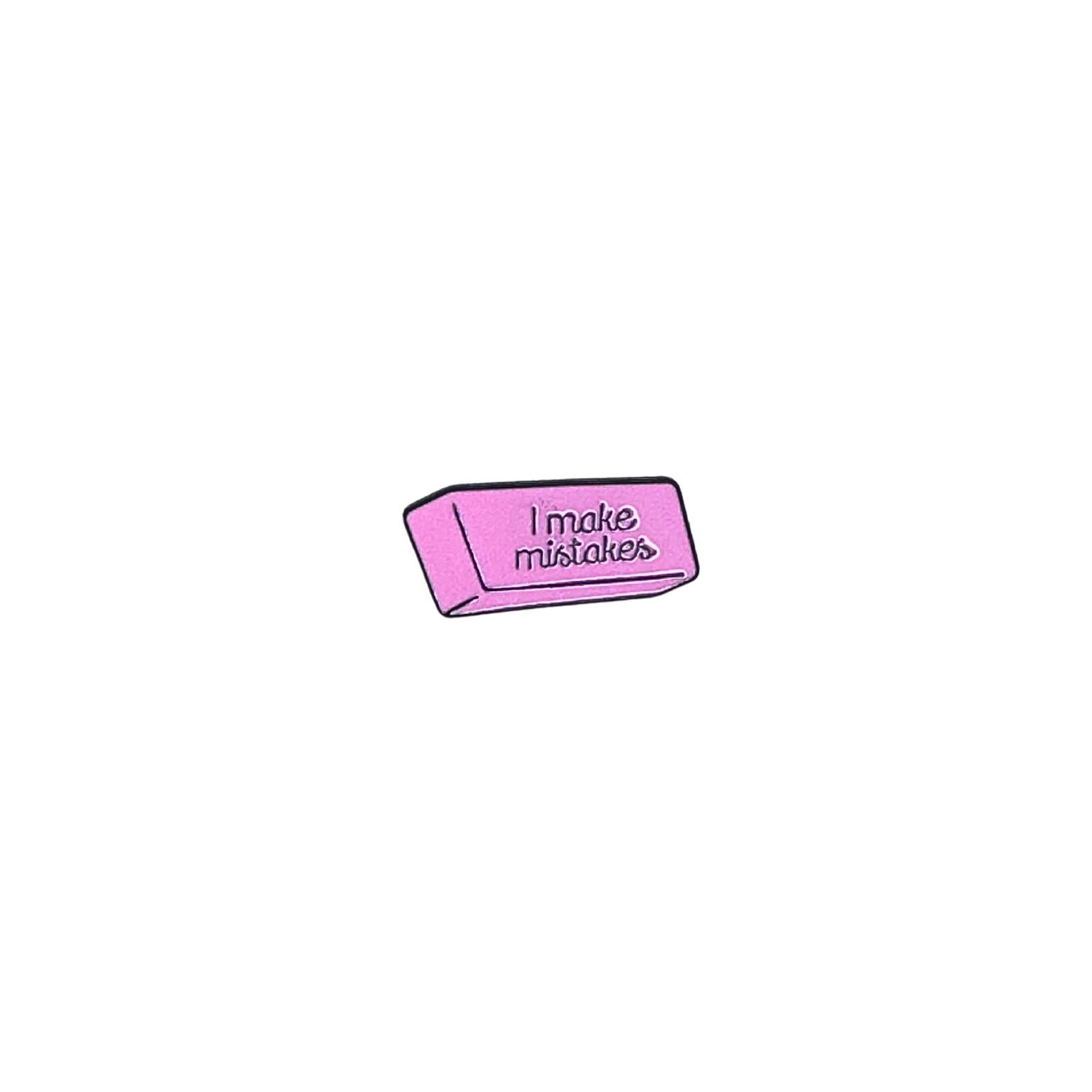Pink enamel pin shaped like an eraser with the phrase "I make mistakes"