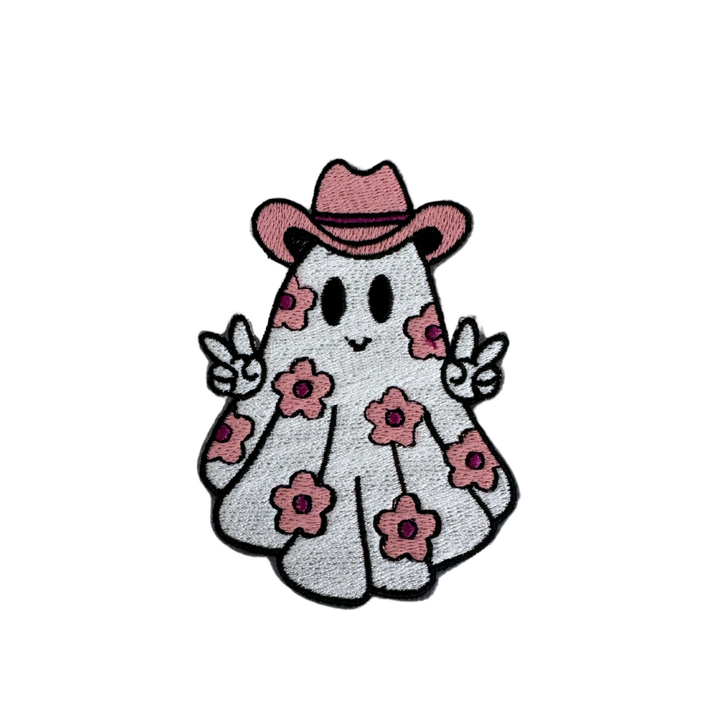 Pink cowboy ghost patch with floral design and peace signs.