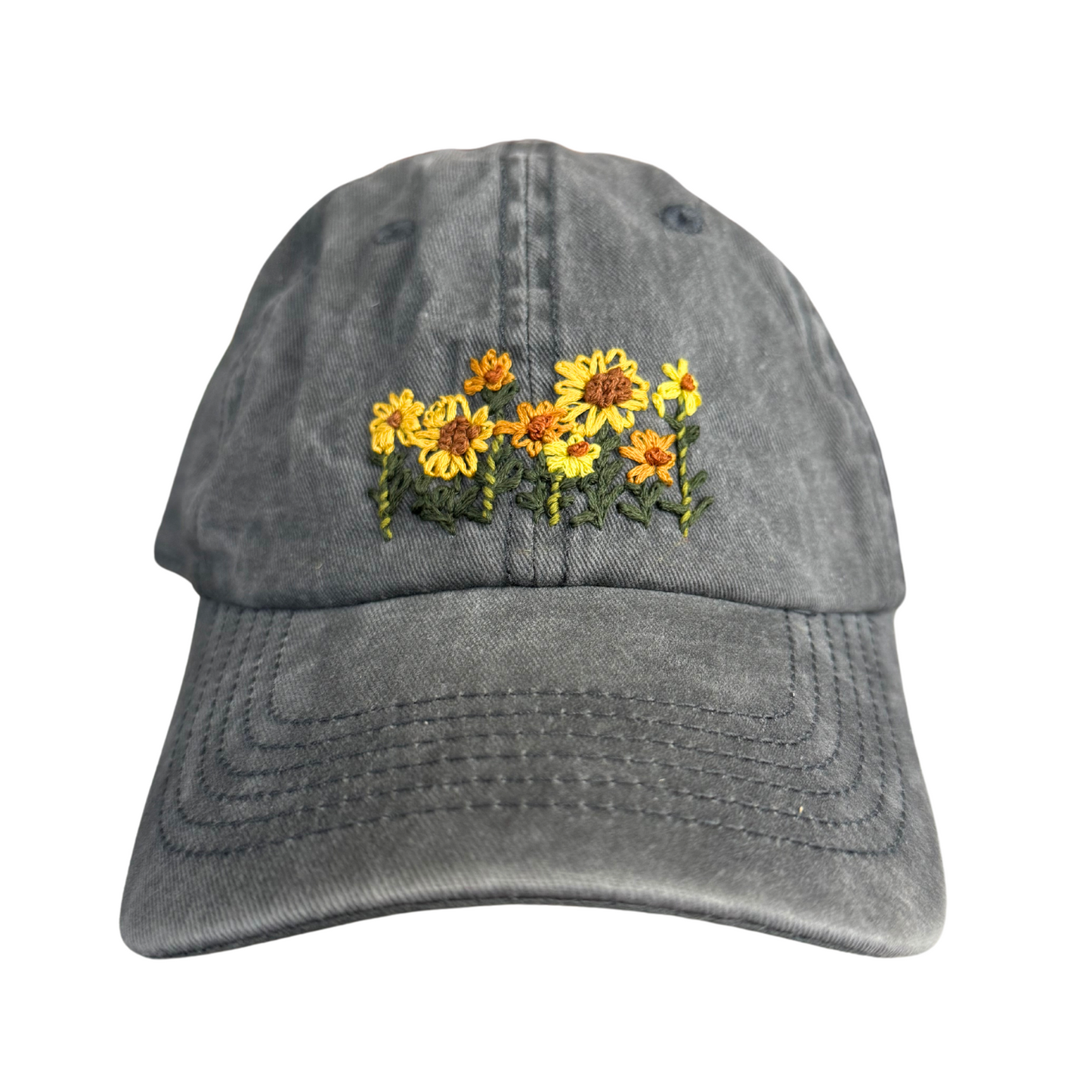 Hand-embroidered sunflower design on grey baseball cap, handmade in Kansas City.