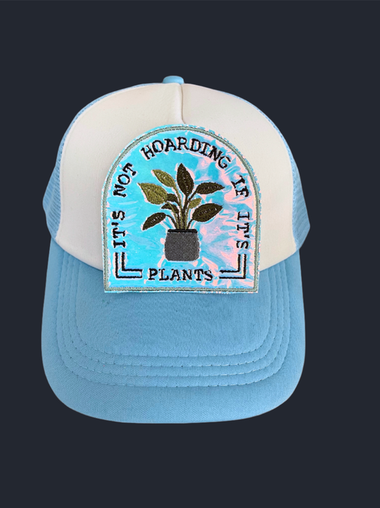 Handmade "It's Not Hoarding If It's Plants" patch with colorful background and embroidered text.