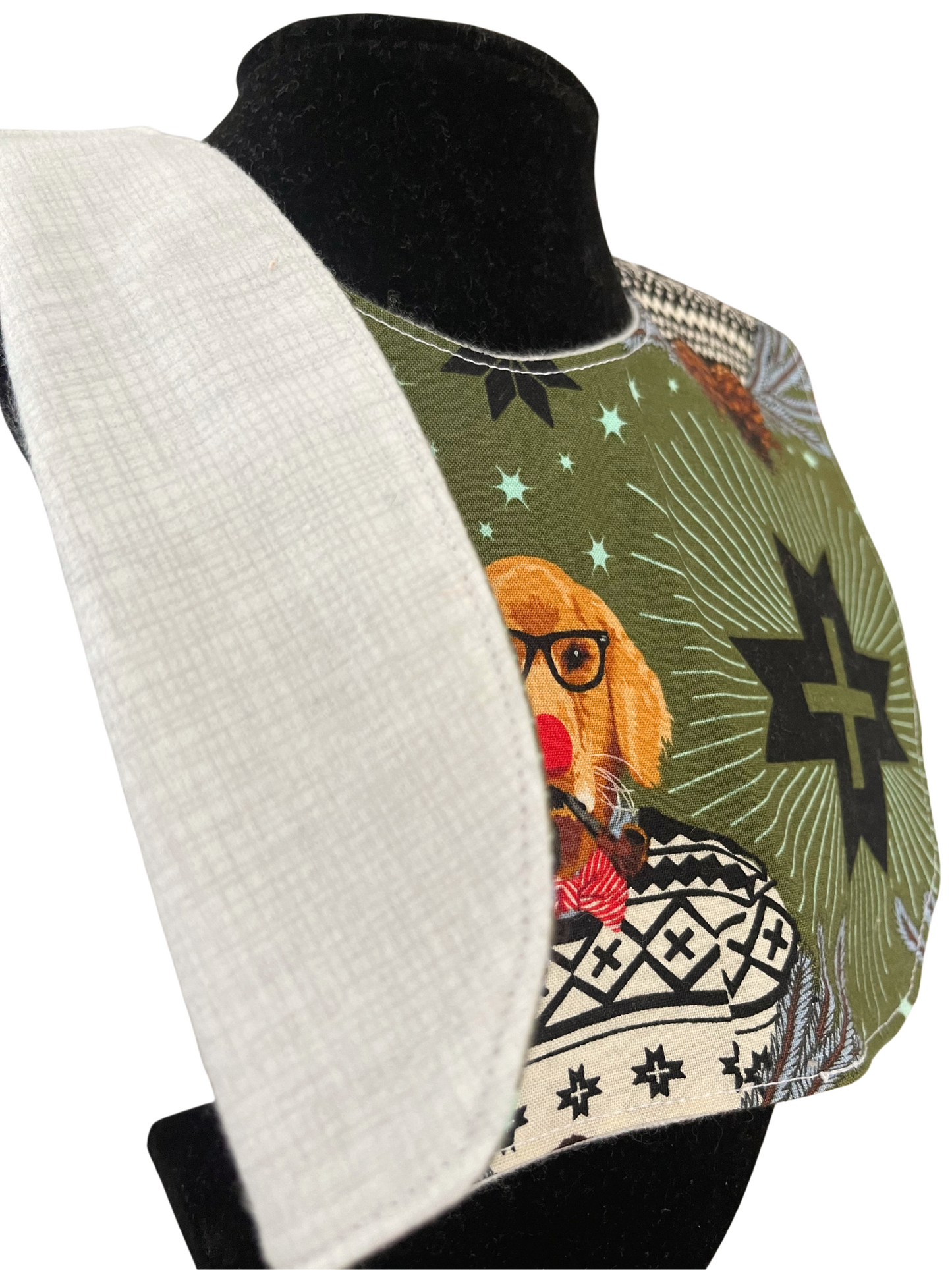 Reversible bib with hipster dog design featuring glasses and a bow tie.