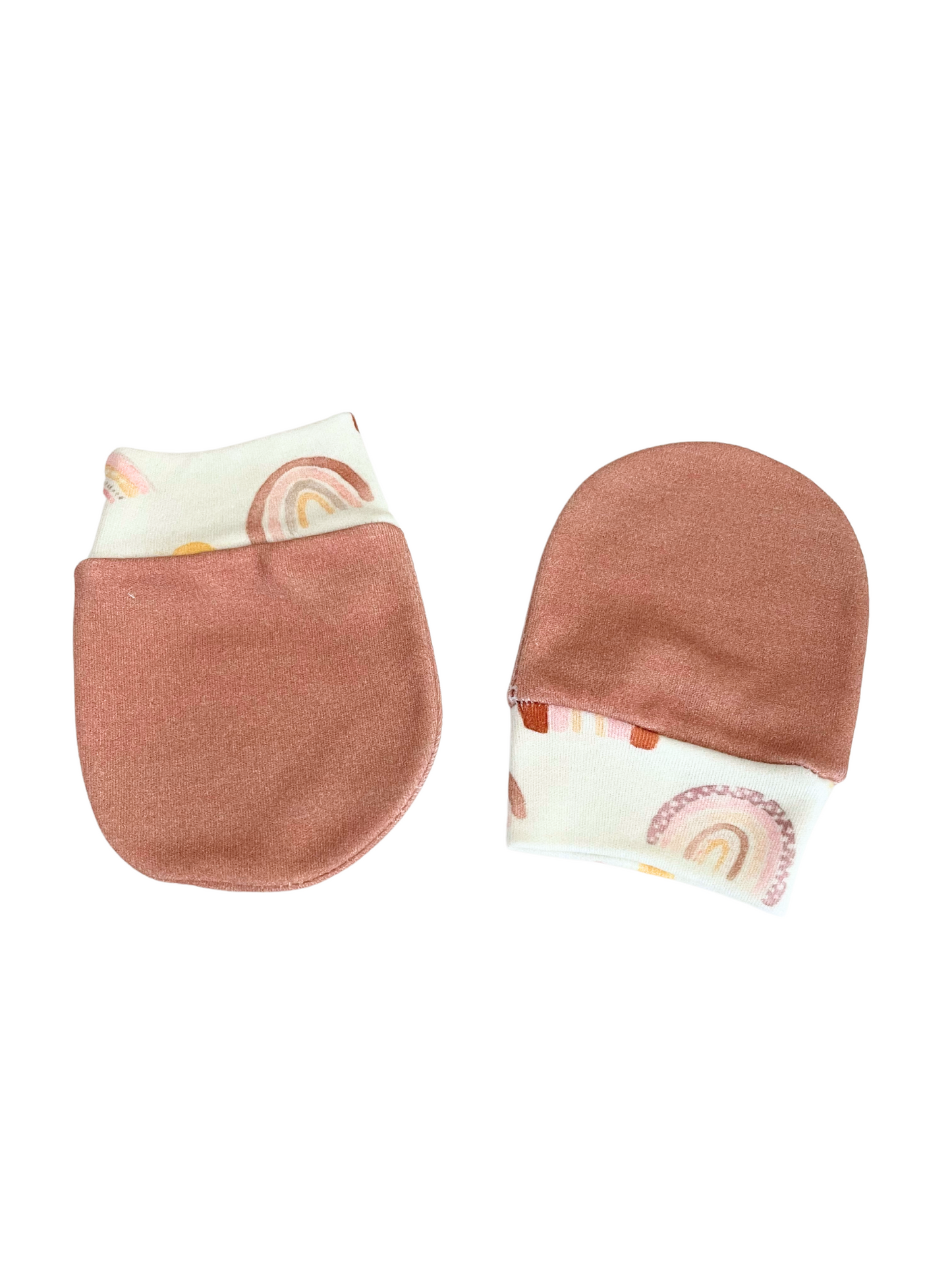 Blush mauve baby scratch mittens with rainbow pattern cuffs in organic cotton knit for newborns.