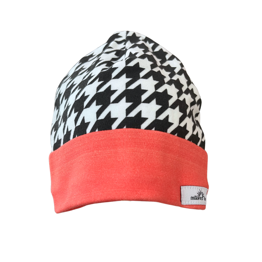 Organic Cotton Baby Beanie with houndstooth pattern and coral cuff, handmade for newborns.
