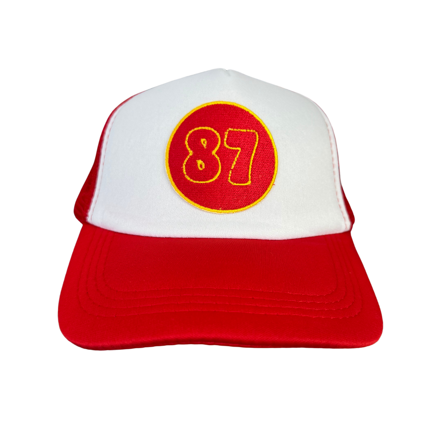 Kansas City Chiefs 87 Travis Kelce red and white trucker hat with embroidered patch.