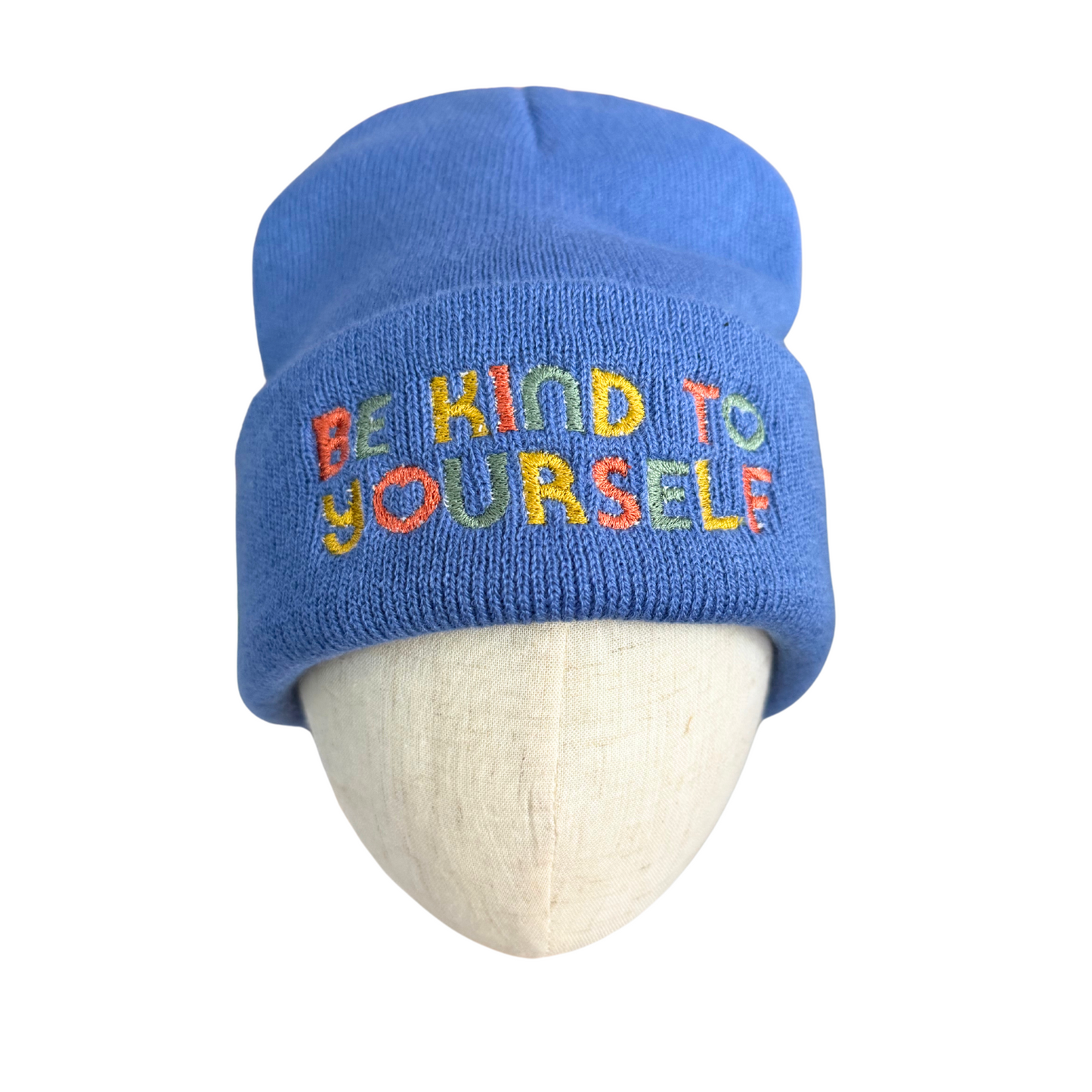 Blue embroidered beanie with "Be Kind to Yourself" positive affirmation.
