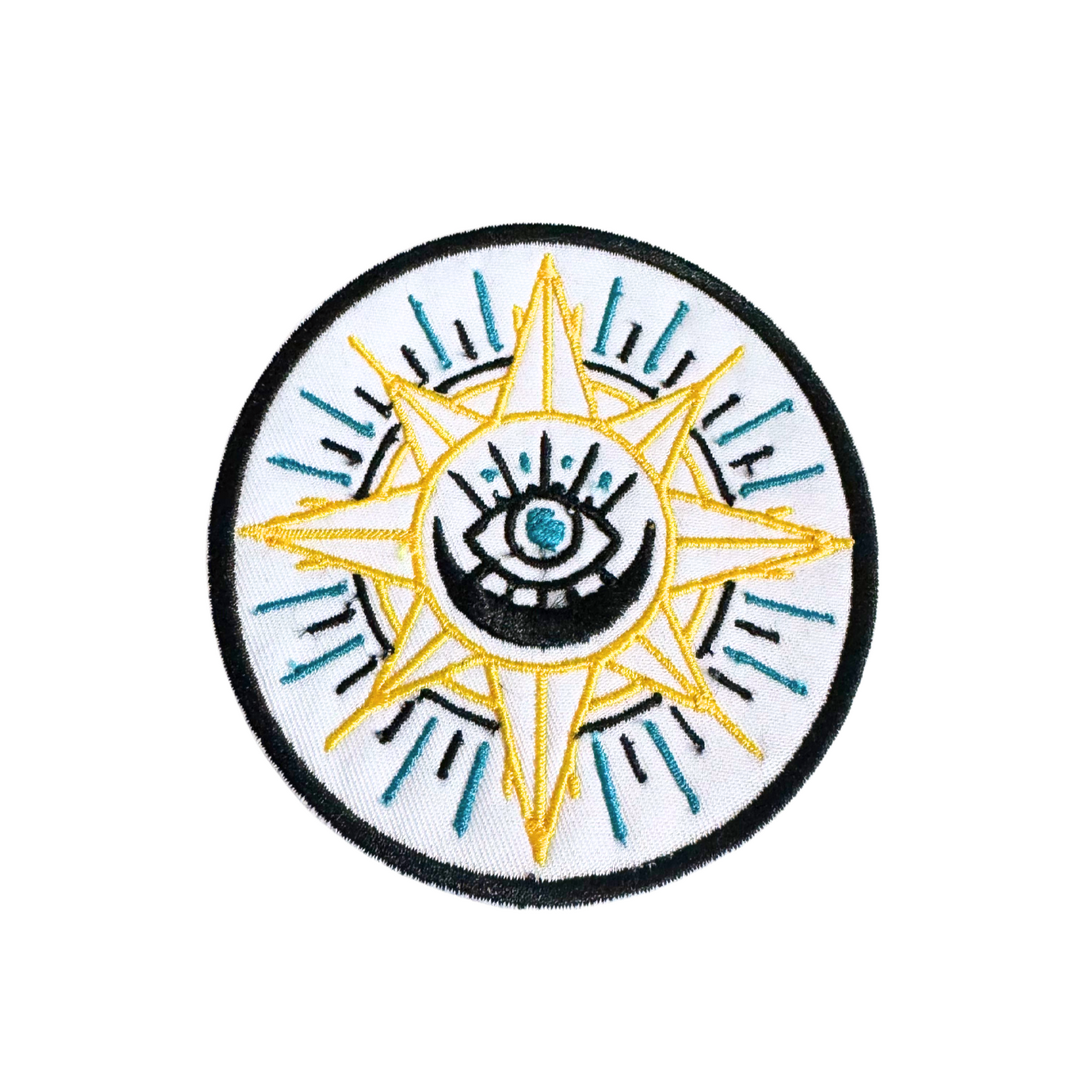 Evil Eye Compass iron-on patch with gold compass design, teal and black embroidery, handmade for good luck.