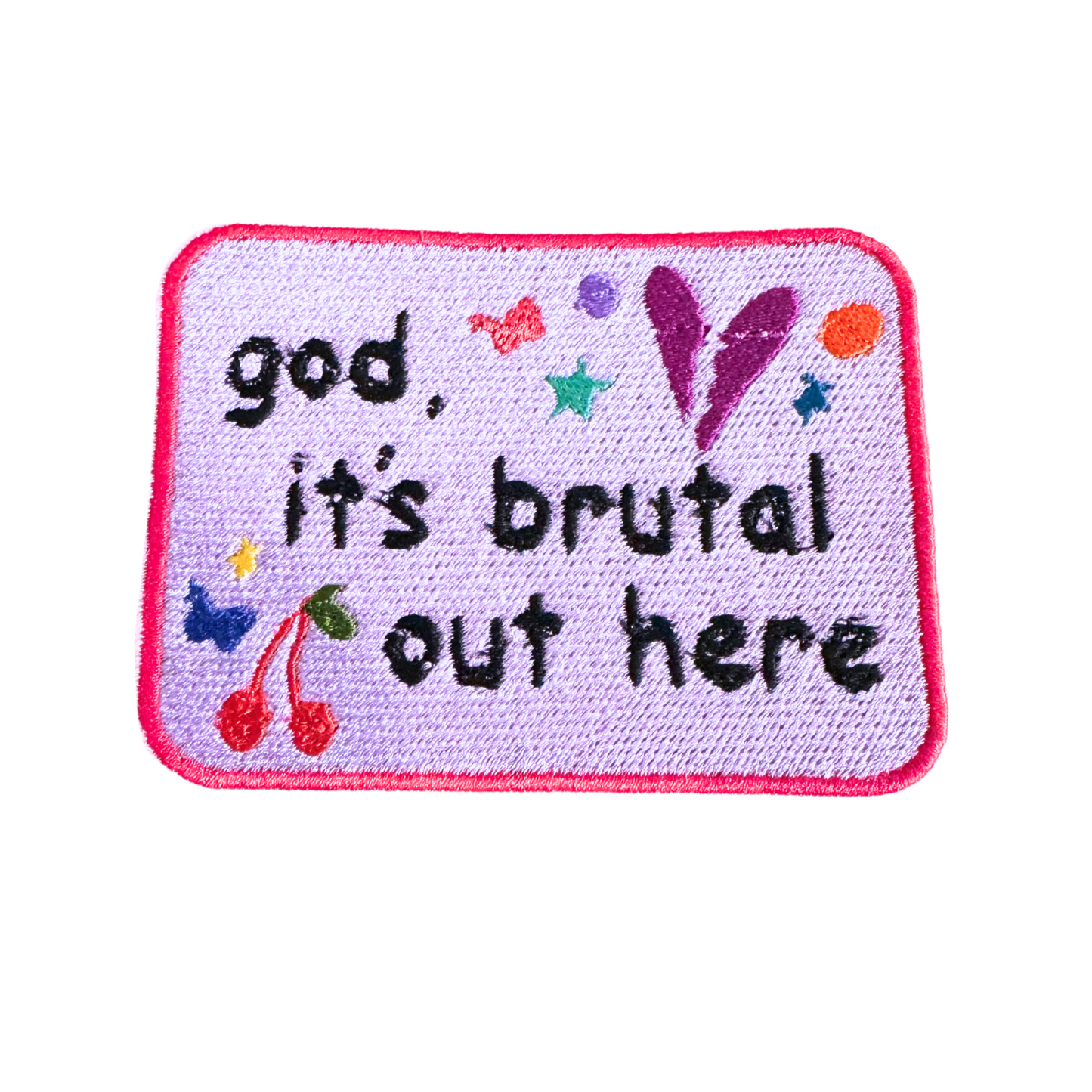 Colorful Olivia Rodrigo inspired iron-on patch with "God, it’s brutal out here" phrase, cherries, butterflies, stars, and broken heart embroidery.