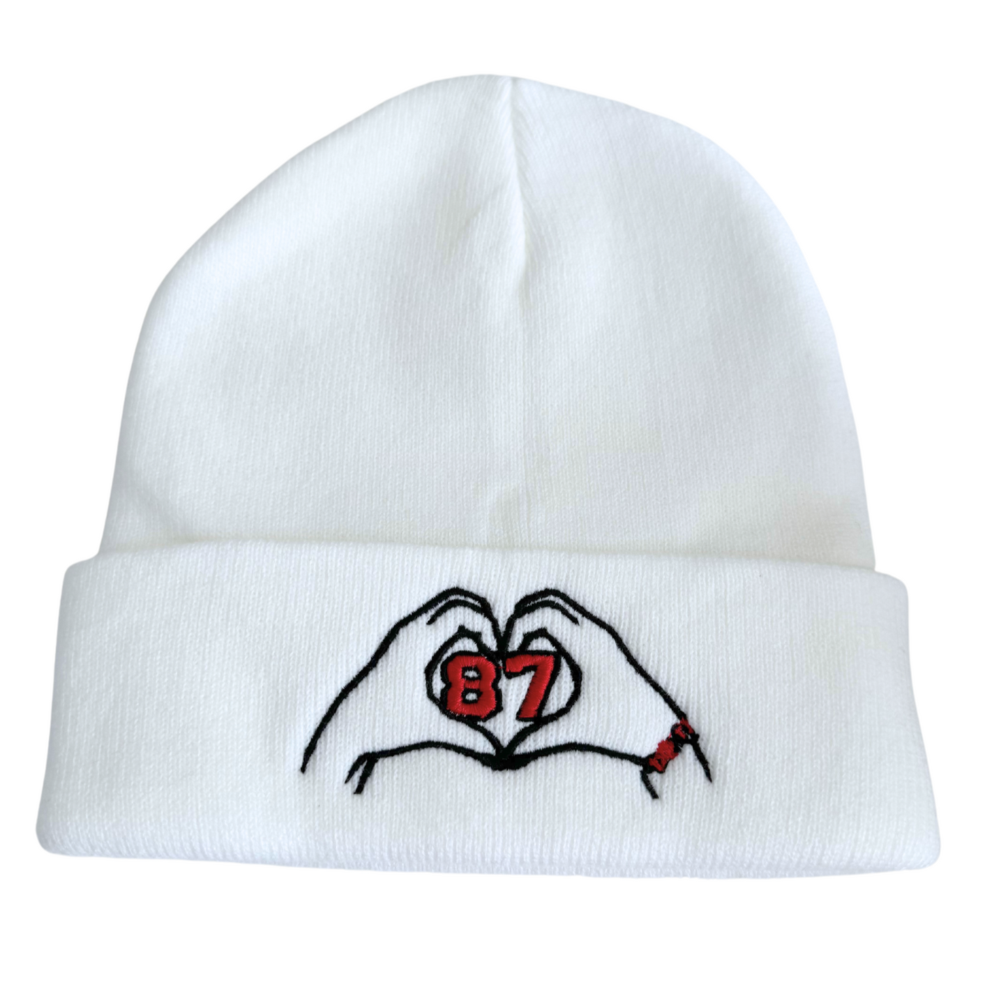 White beanie with embroidered heart hands and “87” design inspired by Travis Kelce and Taylor Swift.