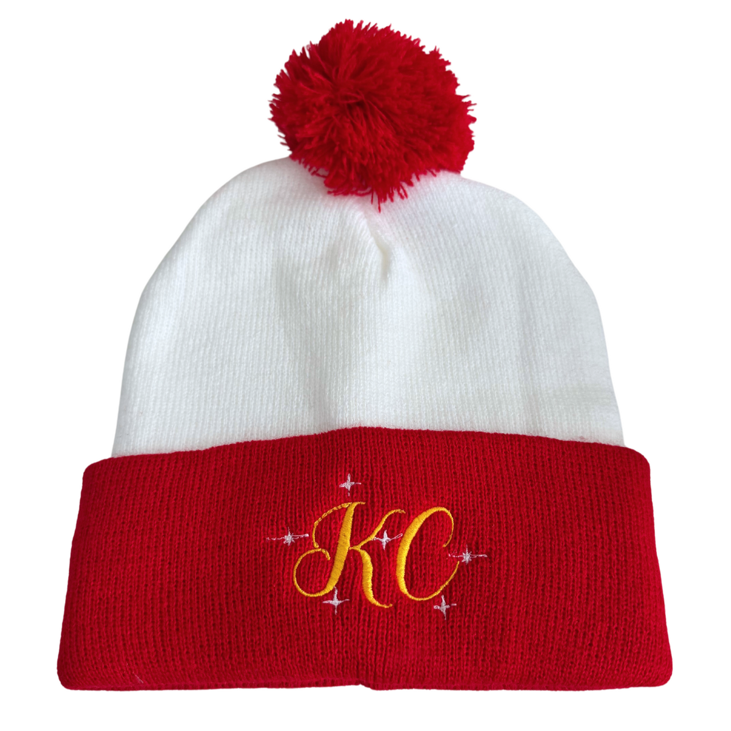 Red and white beanie with a red pom-pom on top and gold "KC" embroidered with sparkle accents, adult size.