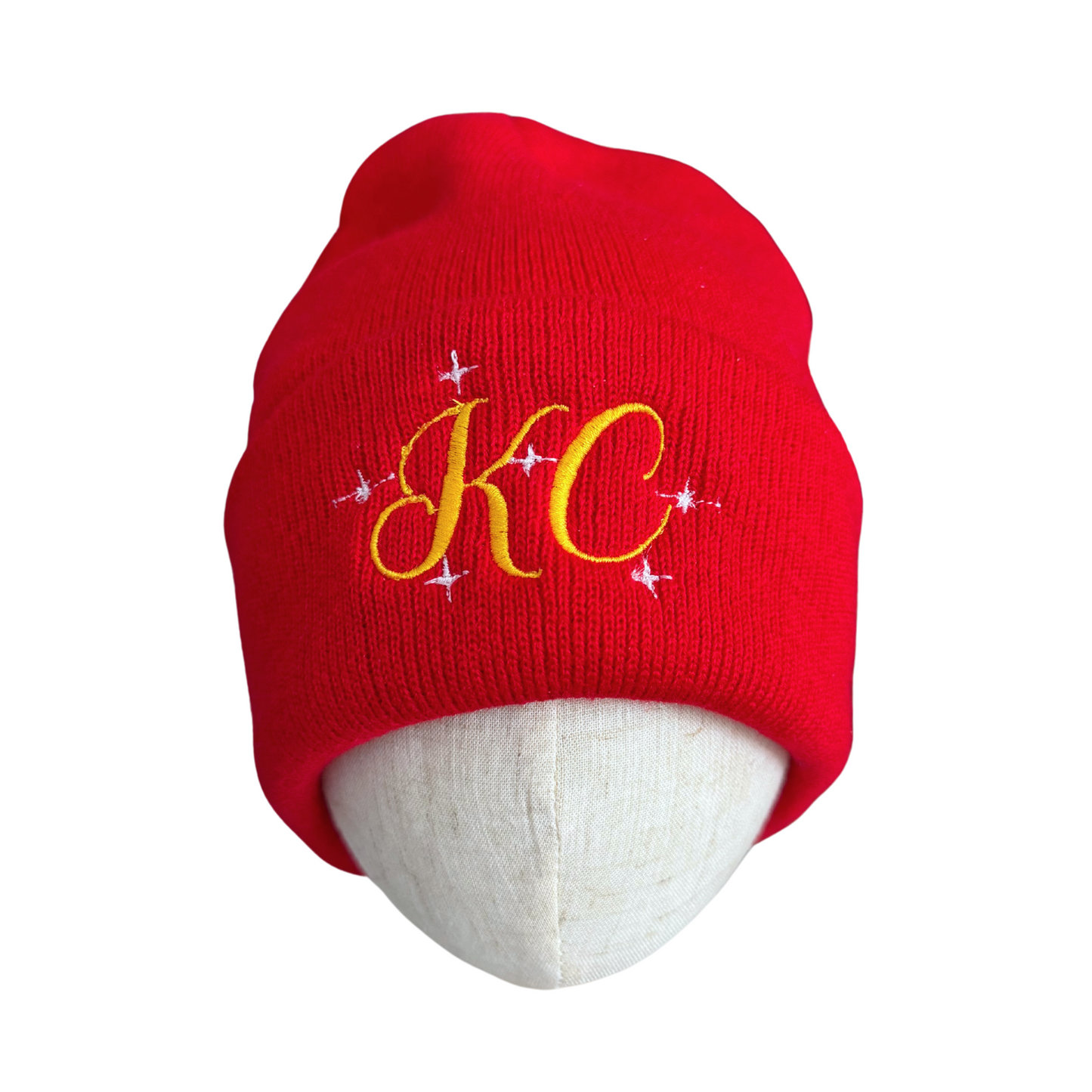Red beanie with gold "KC" embroidery and twinkling stars for Chiefs fans.
