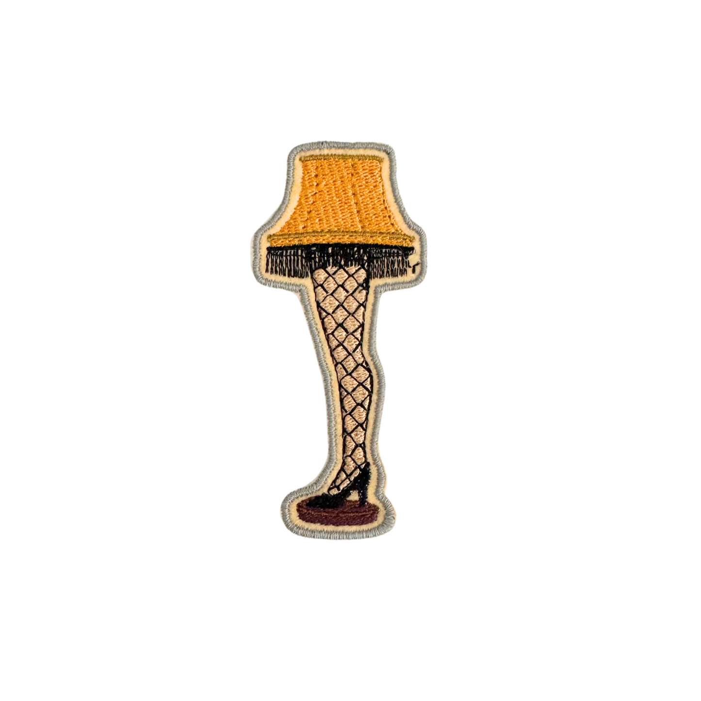 Leg Lamp iron-on patch inspired by A Christmas Story, featuring detailed embroidery and handmade design.