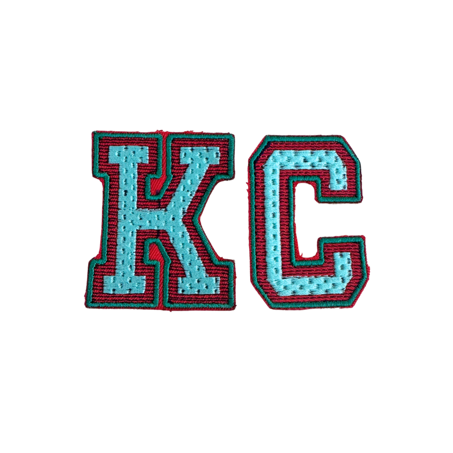 KC varsity letter iron-on patch in aqua blue and red colors, handmade and ready for shipping.
