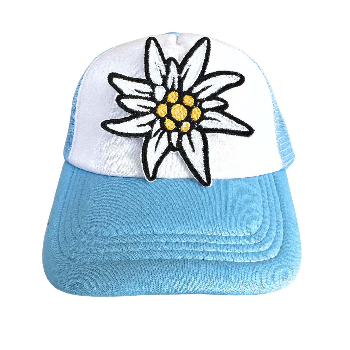 Handmade Edelweiss flower iron-on patch with white petals, golden centers, and black embroidery, ready to ship.
