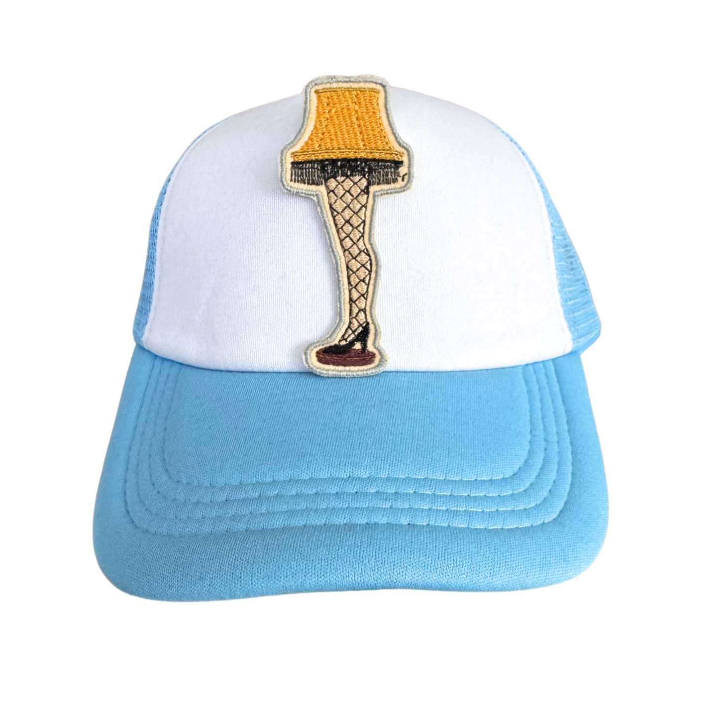 Handmade Leg Lamp iron-on patch inspired by A Christmas Story, featuring detailed embroidery of a golden lampshade and fishnet stockings.