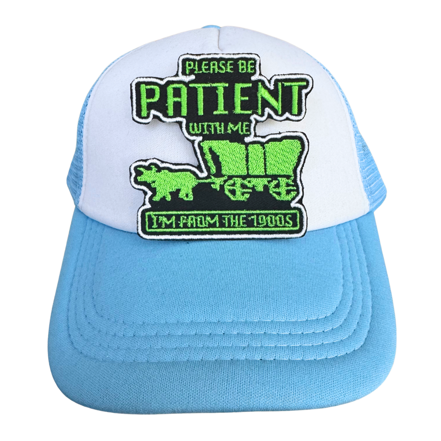"Please Be Patient with Me, I'm from the 1900s" iron-on patch with neon green embroidery featuring a covered wagon inspired by the Oregon Trail game, handmade and ready to ship.