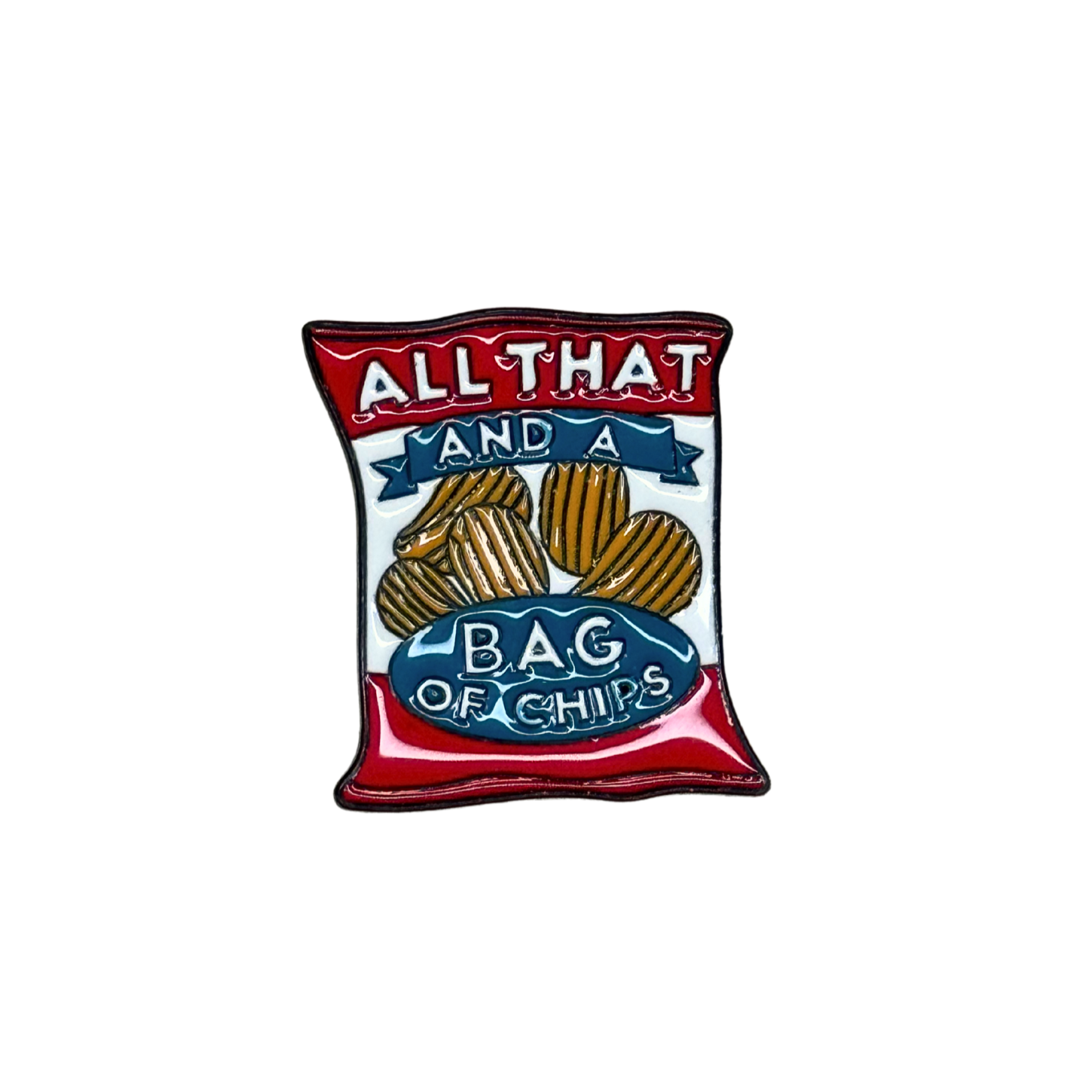 A red, white, and blue enamel pin shaped like a bag of chips that says "All That and a Bag of Chips."