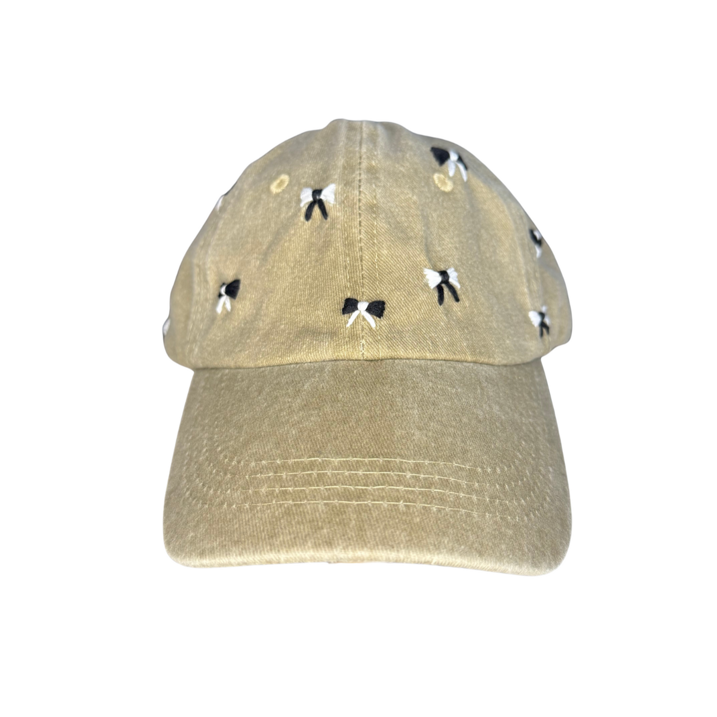 Beige cap with black and white patterns on a white background