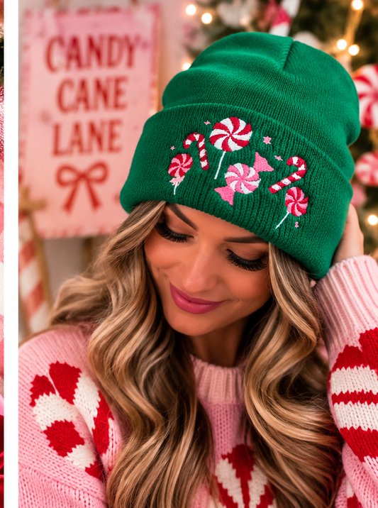 Woman wearing green candy cane and peppermint embroidered Christmas beanie