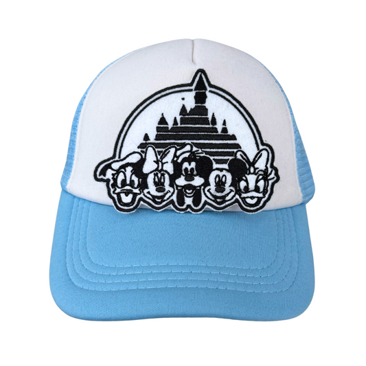 Black and white Disney friends patch ironed onto white and blue trucker hat