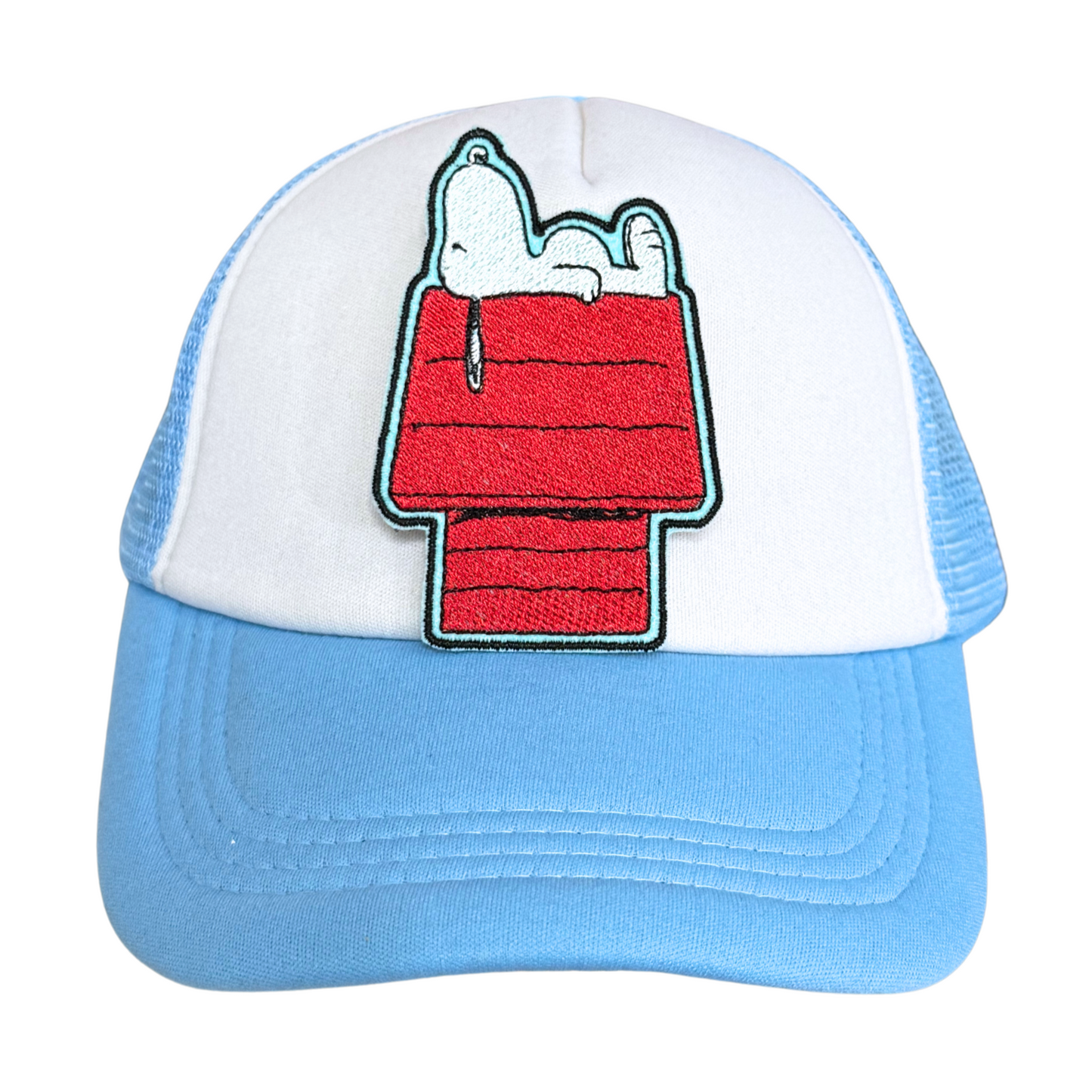 Light blue and white trucker hat with an embroidered patch of a lounging dog on a red doghouse.