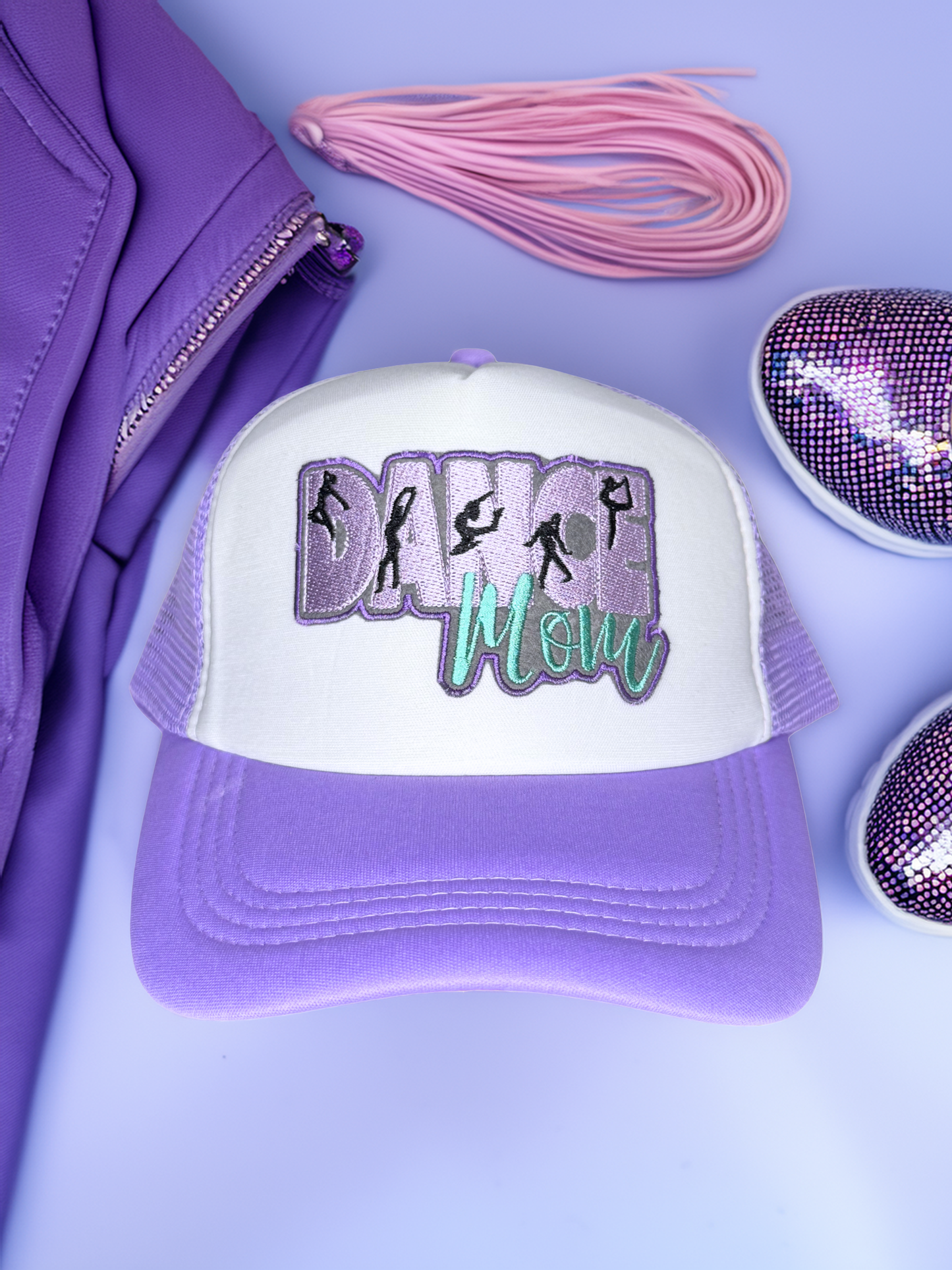 Purple and white cap with 'Dance Mom' text and dancer graphics on a purple background.