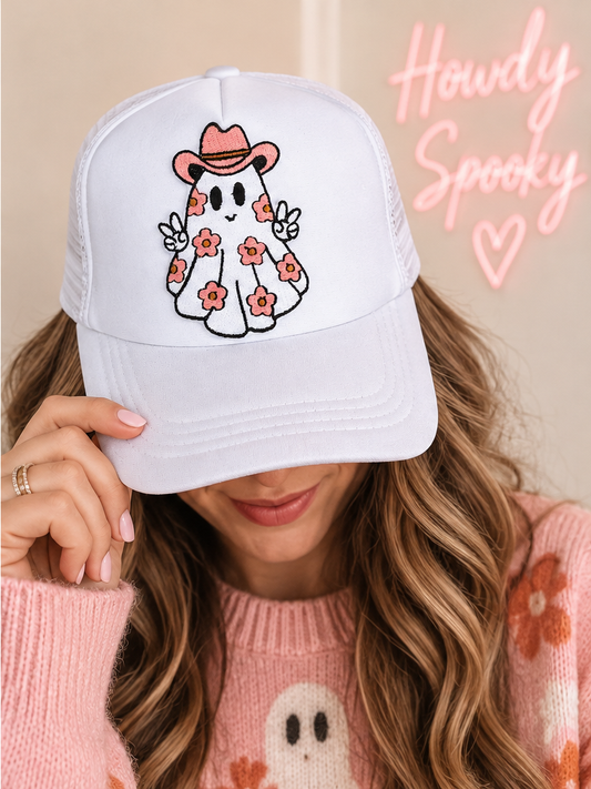 Model wearing white Floral Cowboy Ghost Halloween trucker hat