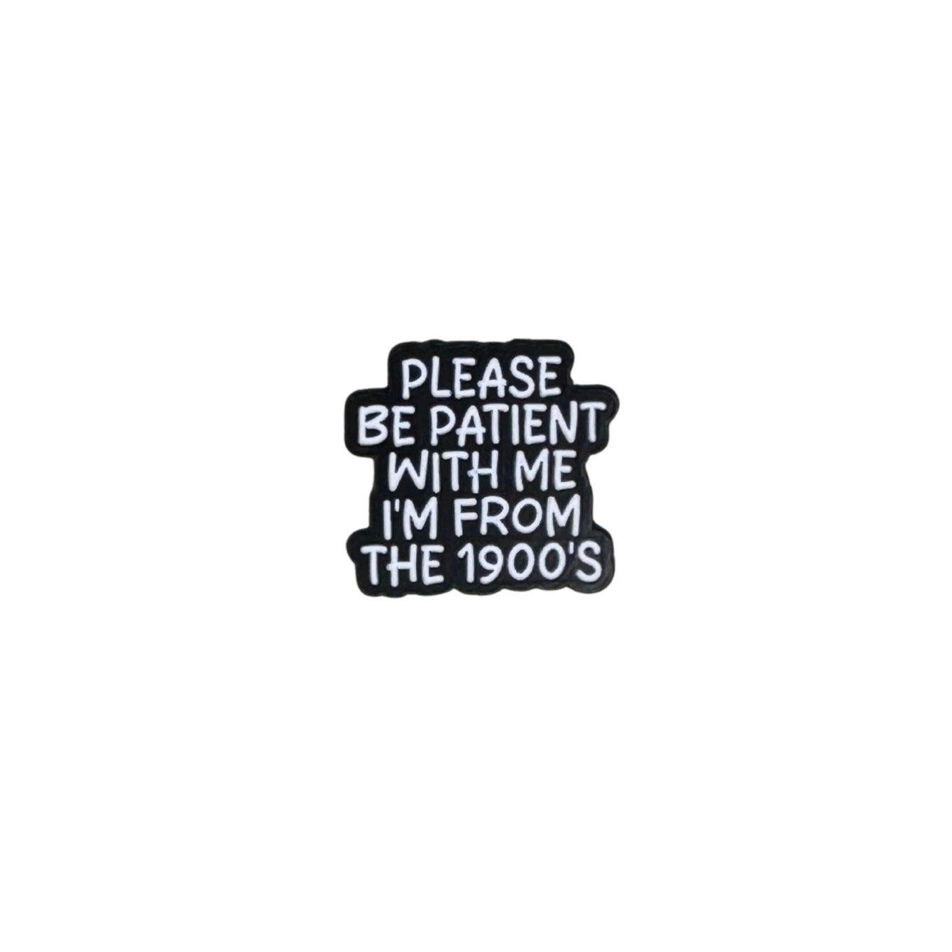 Enamel pin that reads “Please be patient with me, I’m from the 1900s” on white background