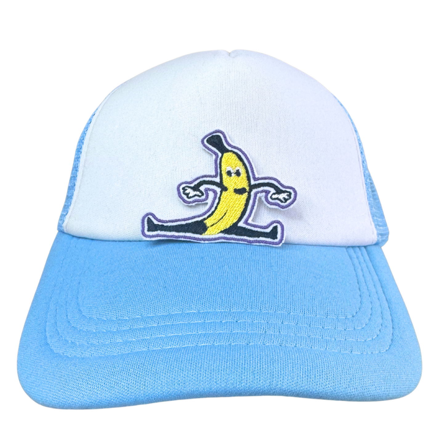 Light blue and white trucker hat with an embroidered dancing banana patch attached.