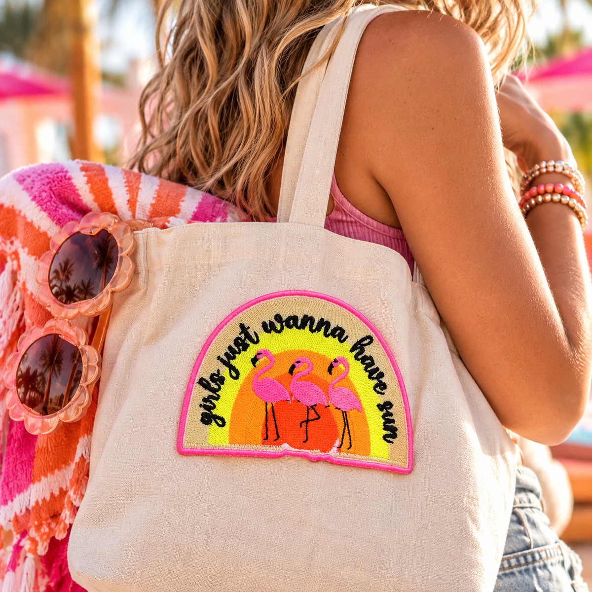 Girls Just Wanna Have Sun flamingo embroidered patch on a cream tote bag