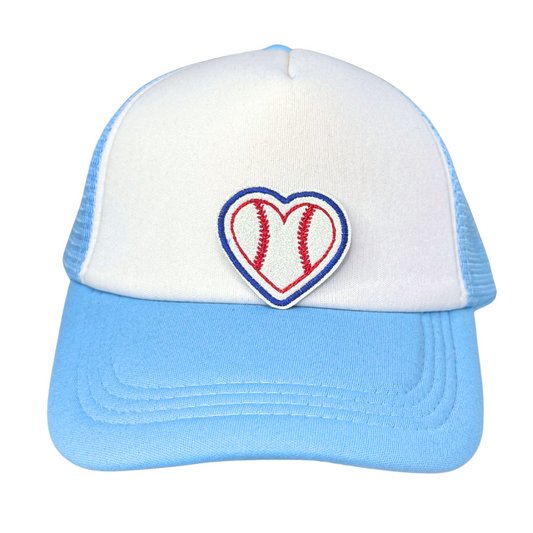 White and light blue trucker hat featuring a heart-shaped glitter baseball patch with red stitches and a blue border