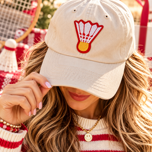 Kansas City Shuttlecock iron-on patch styled on cream hat