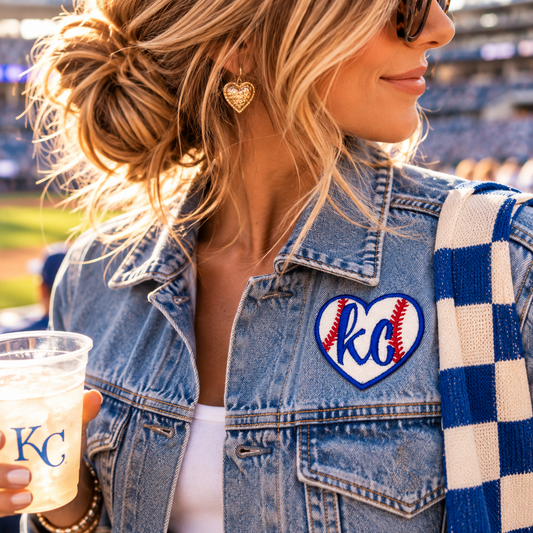 KC Baseball Heart Iron-On Patch on denim jacket at a baseball game