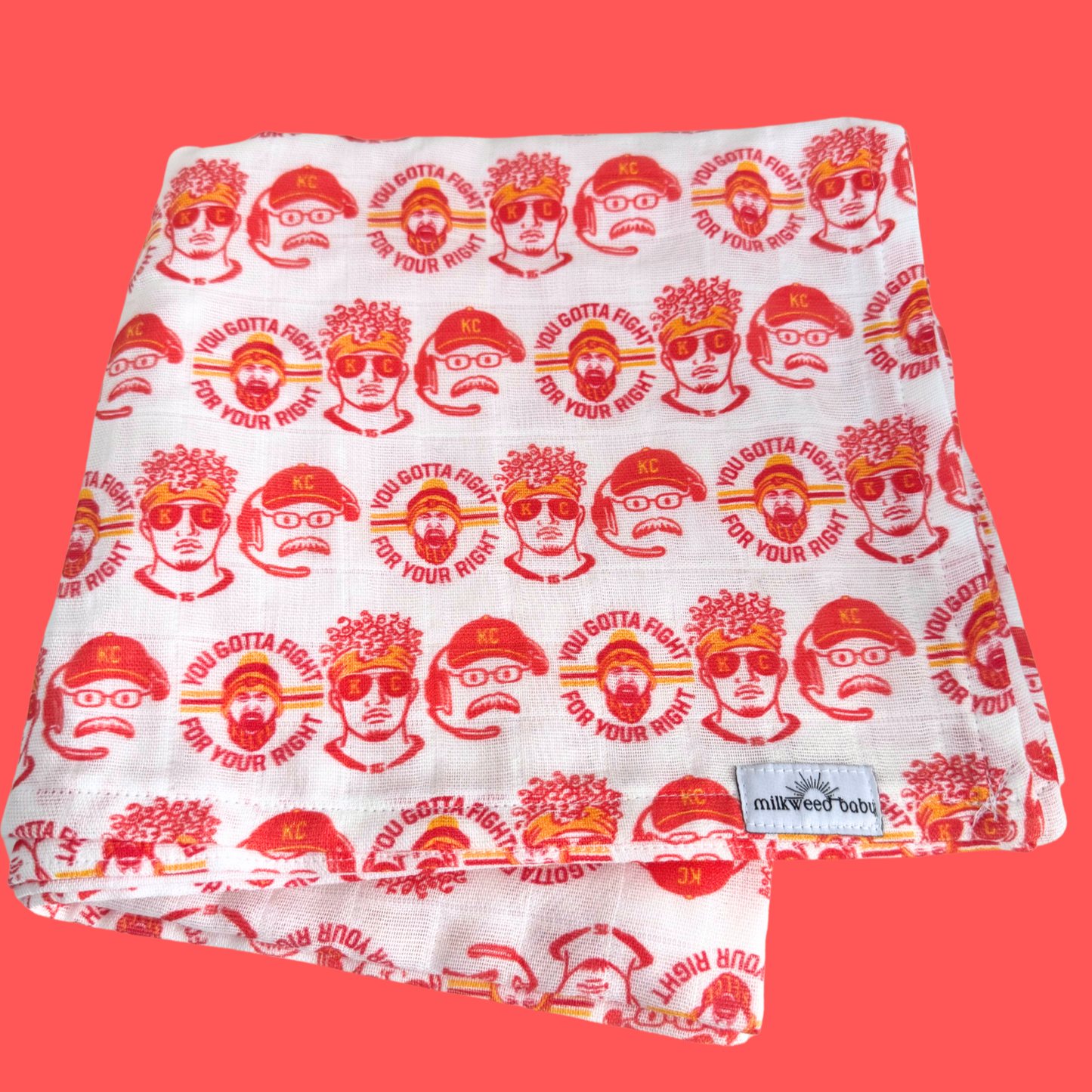 KC Chiefs-inspired baby swaddle blanket displayed on a red background, featuring Patrick Mahomes, Travis Kelce, Andy Reid, and the phrase "You Gotta Fight for Your Right" in a repeating pattern.