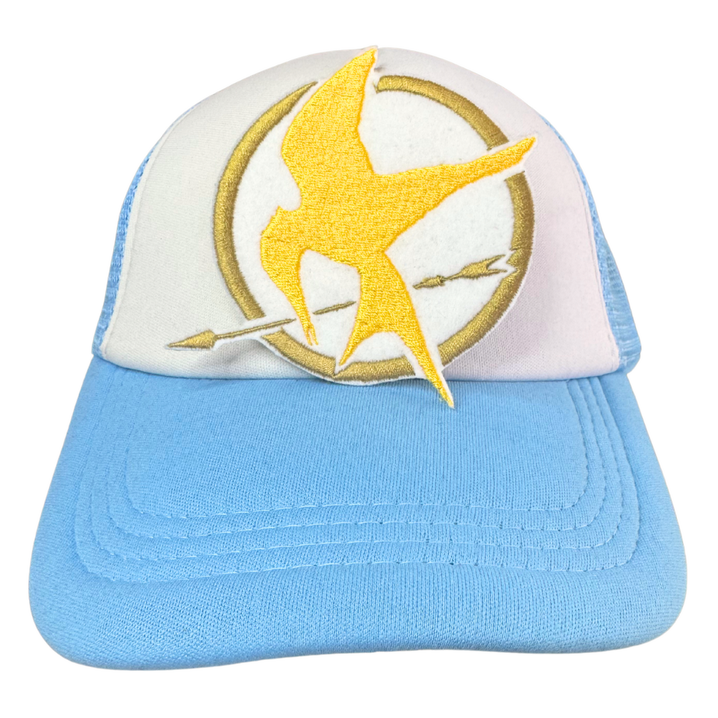 Light blue and white trucker hat with an embroidered golden bird and arrow patch attached.