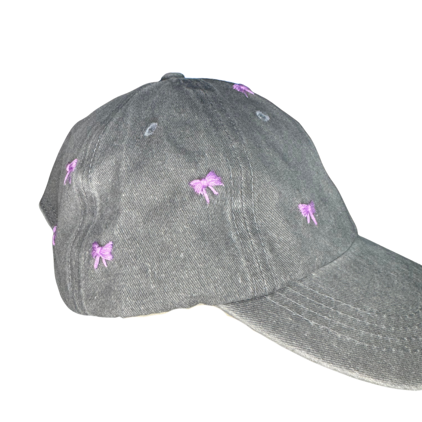 Gray cap with purple bows on a white background