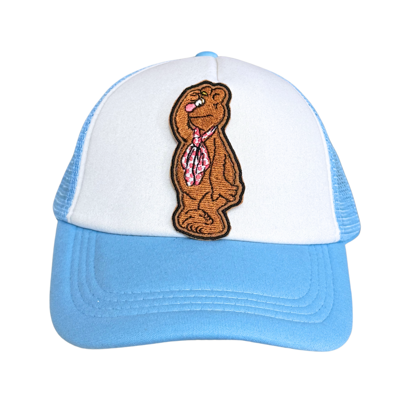 Light blue and white trucker hat with an embroidered bear patch attached.