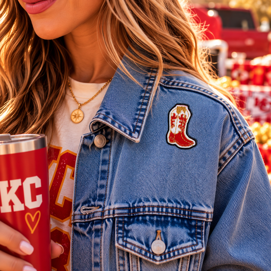 Red and gold Kansas City cowboy boot patch styled on denim jacket