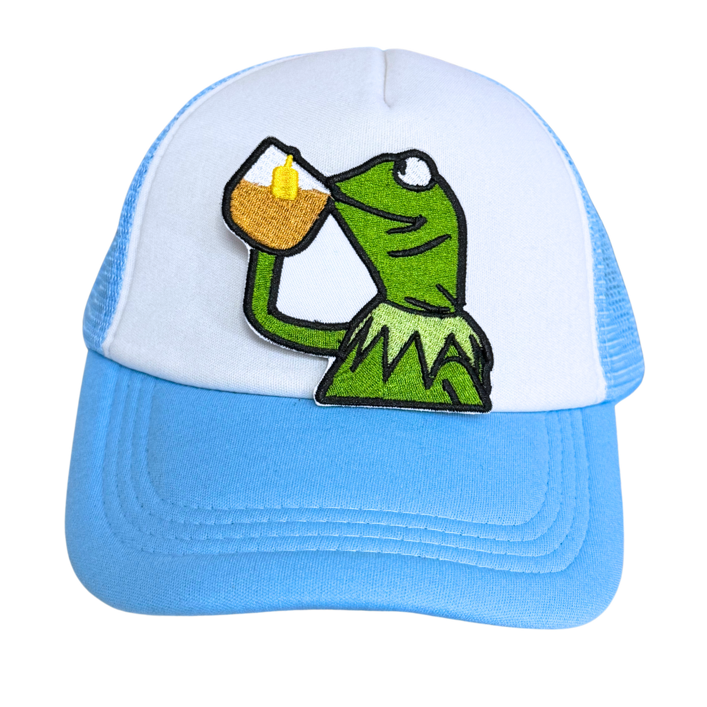 Light blue and white trucker hat with an embroidered "sipping tea frog" patch attached.
