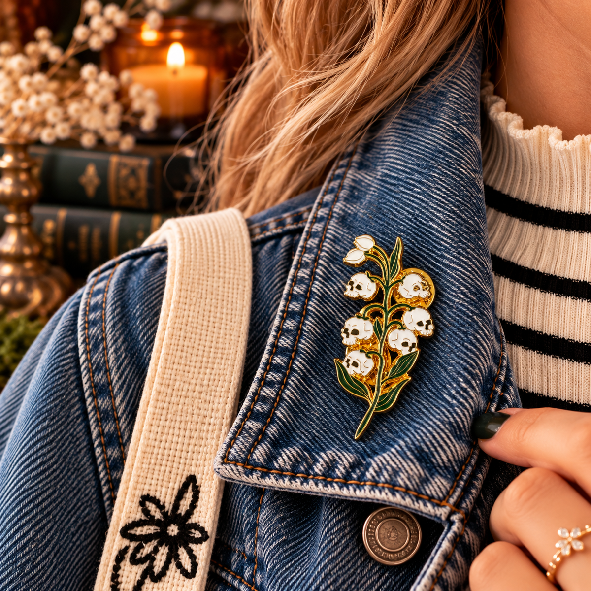 Skull lily of the valley gothic botanical enamel pin lifestyle image