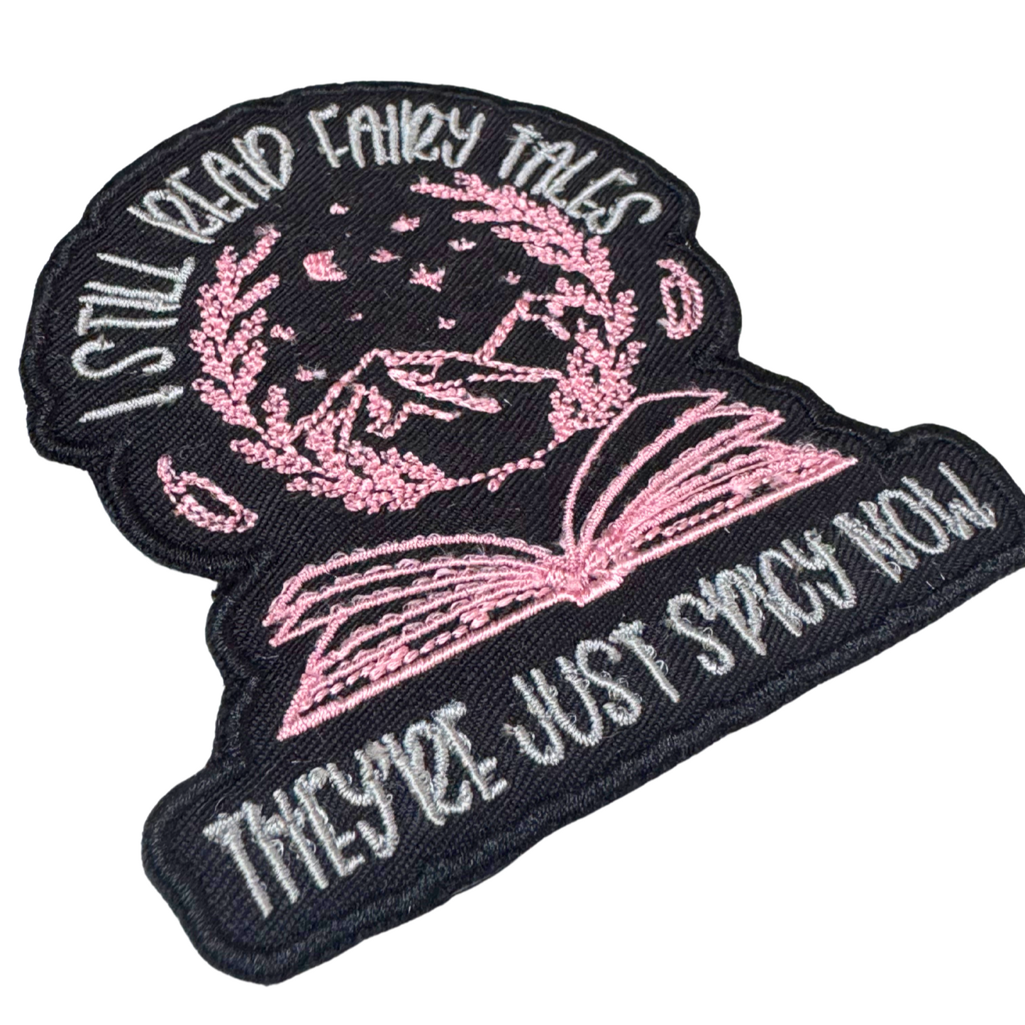 angled detail closeup of embroidered spicy fairy tales patch