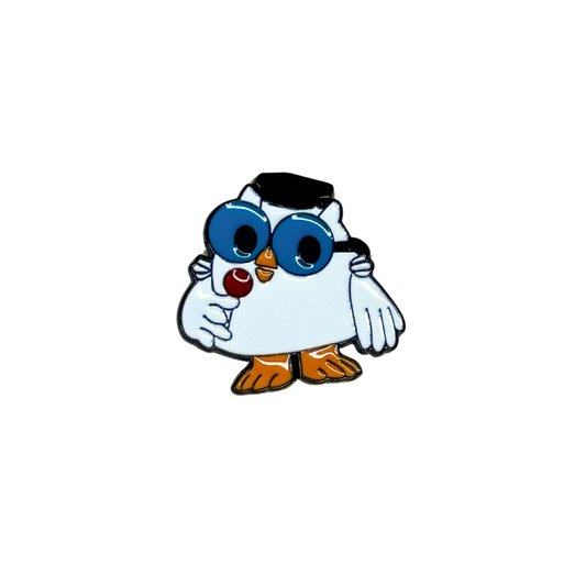 Enamel pin shaped like the Tootsie Pop owl with lollipop, white background