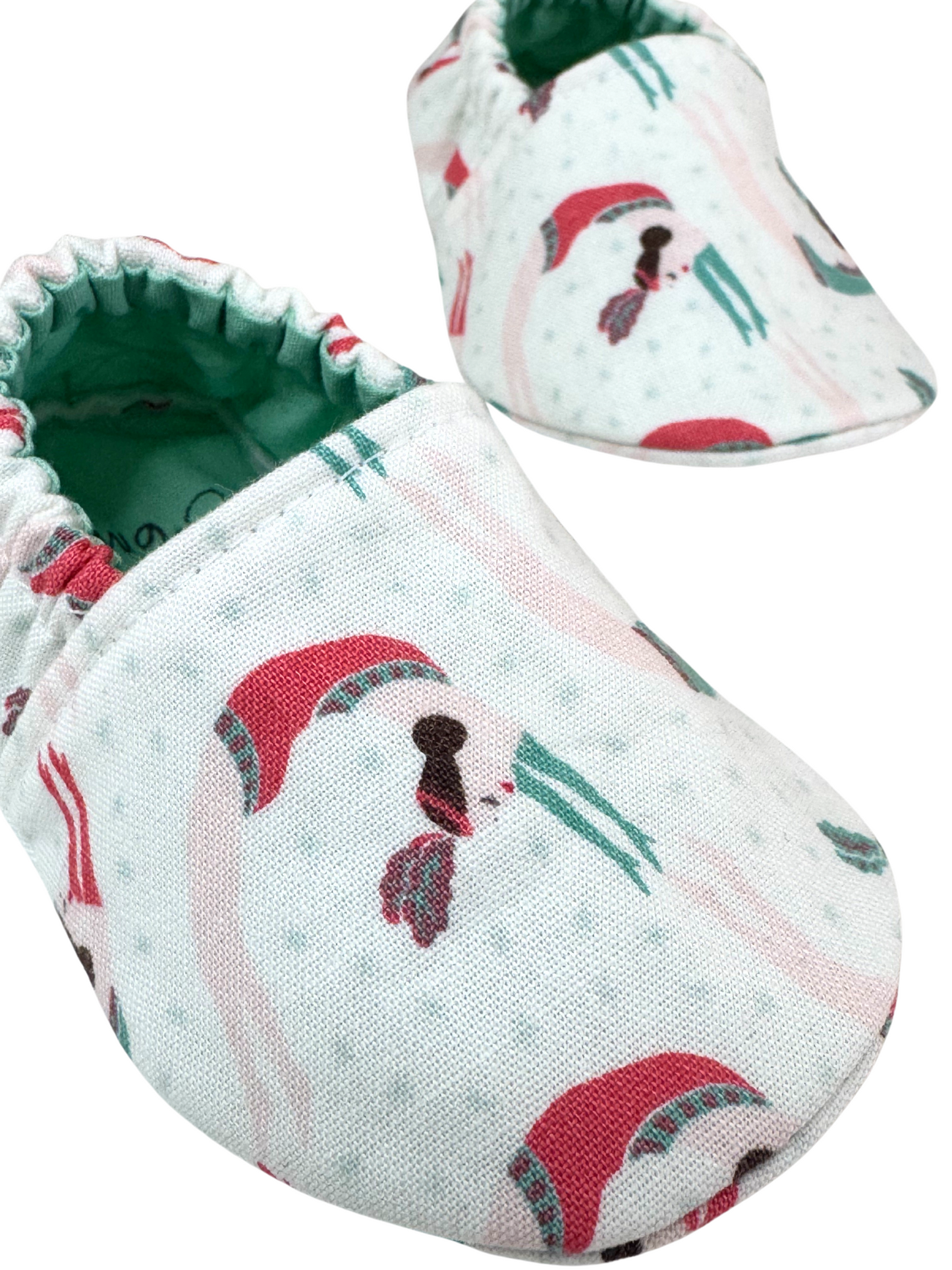 “Close-up of trapeze artist women print on handmade baby moccasins, soft sole, 3-6 months”